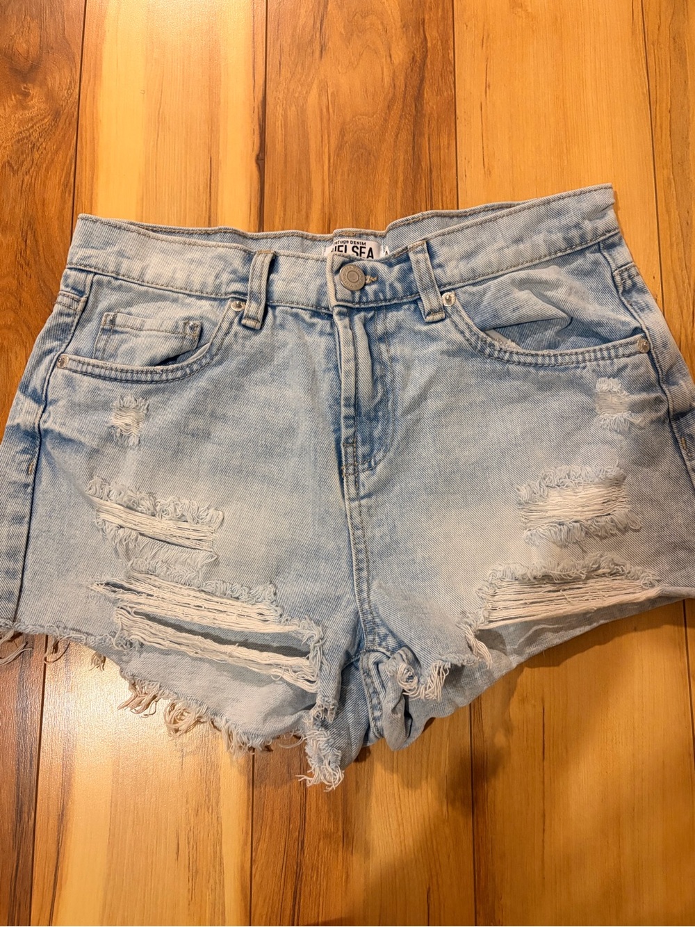 Distressed Light Blue Denim Cutoff Shorts for Women